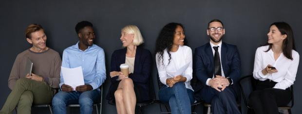 diverse millennials, and a senior woman executive. share a moment of understanding