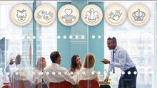 office workers around a table with archetype symbols over their heads